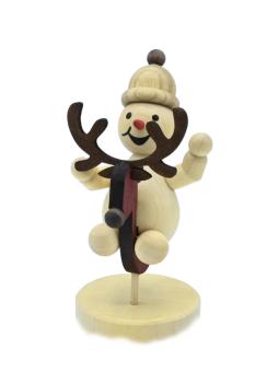 Schneemann Junior auf Schaukeltier